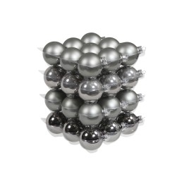 A stack of shiny silver and gray decorative balls with a smooth, reflective surface.