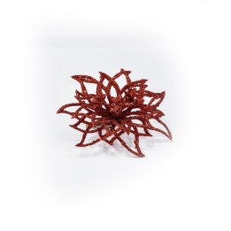 Fleur stylisée en rouge brillant, aux pétales découpés et scintillants.