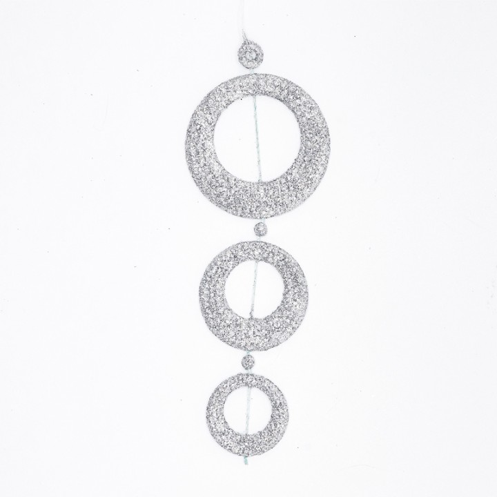 Three shimmering silver circles of varying sizes, adorned with sparkling glitter.