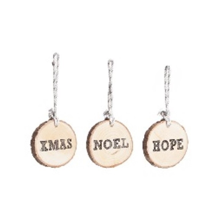Three wooden slices with twine, each engraved with festive words: XMAS, NOEL, HOPE.