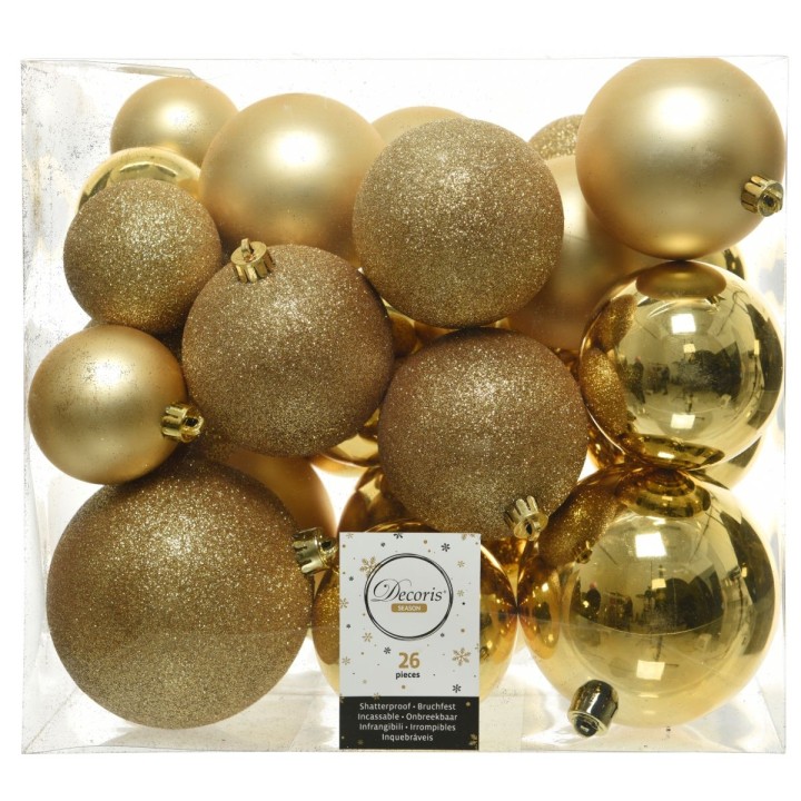 Boules de Noël dorées, brillantes et pailletées, dans un emballage transparent.