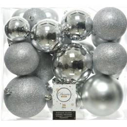 A collection of shiny silver and glittery ornaments in various sizes and shapes.