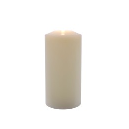 A smooth, ivory pillar candle with a soft glow at the top.
