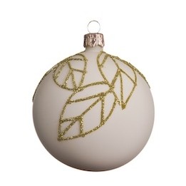 A matte white ornament adorned with delicate golden leaf designs.