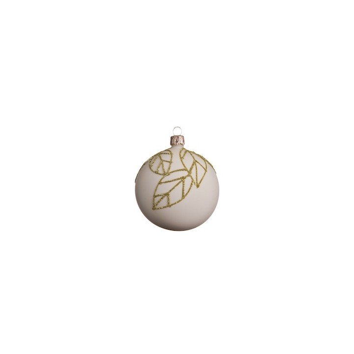 A matte white ornament adorned with delicate golden leaf designs.