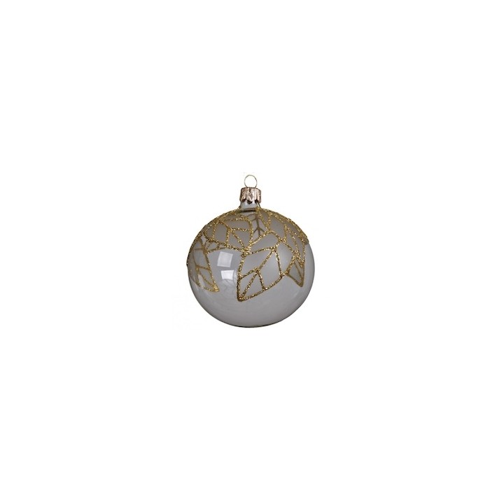 A round glass ornament in white with delicate gold leaf patterns.