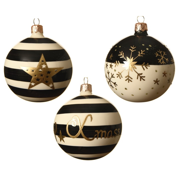 Drie kerstballen met zwart-witte strepen, gouden sterren en sneeuwvlokken. Elegante, feestelijke ...