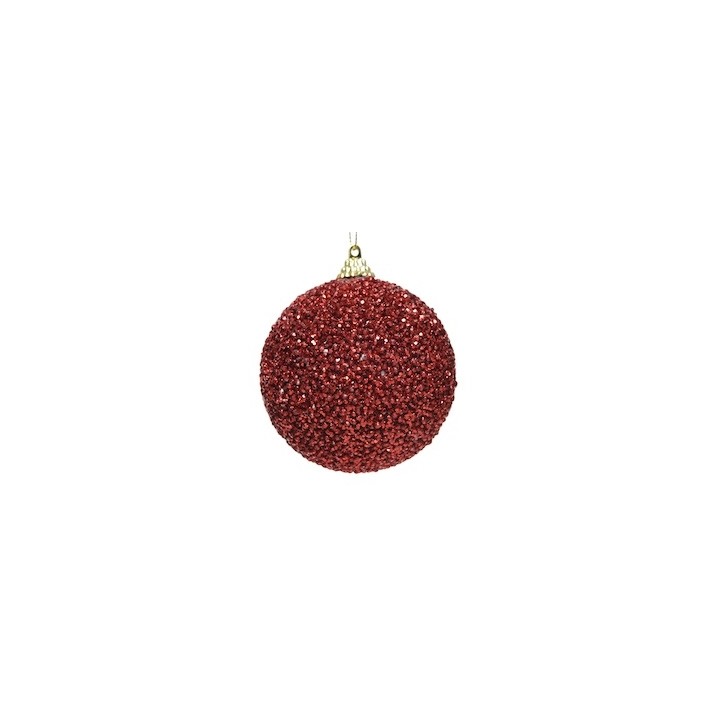 A shiny red ornament covered in glitter, round with a gold top for hanging.