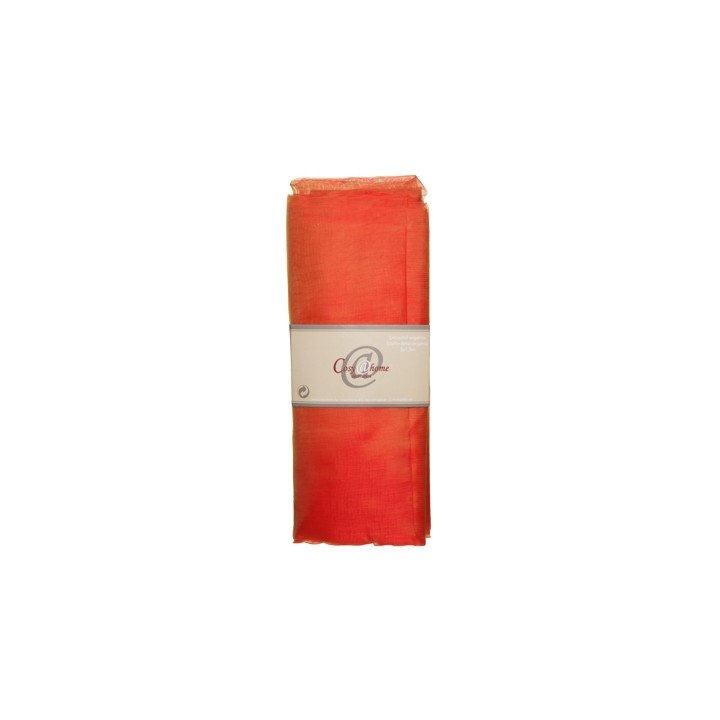 A vibrant orange scarf, elegantly folded with a simple white label.