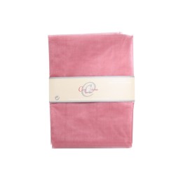 Soft pink fabric neatly folded, wrapped with a simple label in a neutral tone.