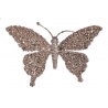 A shimmering butterfly shape embellished with sparkling gemstones and a metallic finish.