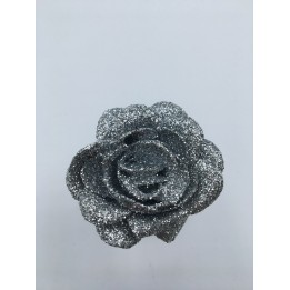 A sparkling silver rose with glittery petals, showcasing a delicate and elegant design.