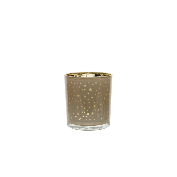 A glass candle holder with a gold star pattern and a shiny gold rim.
