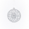 A delicate silver ornament with intricate lace-like patterns, shimmering against a white background.