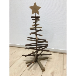 A rustic wooden Christmas tree made of twigs, topped with a simple star.