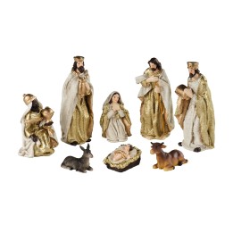 A vibrant nativity scene with ornate figures, gold accents, and small animal figurines.