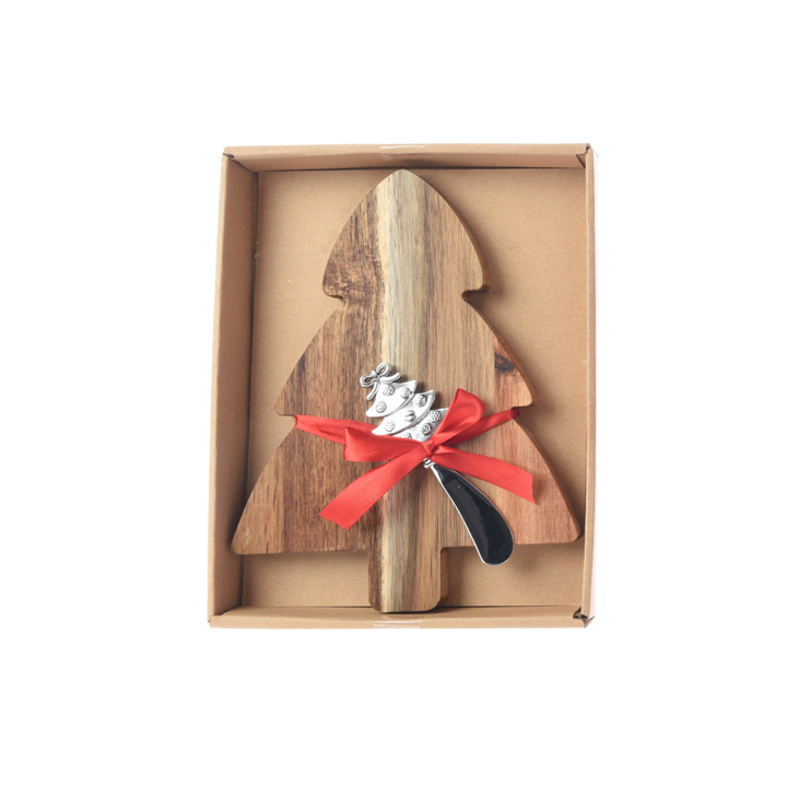 A wooden Christmas tree-shaped cutting board with a red ribbon and a silver-tipped knife.