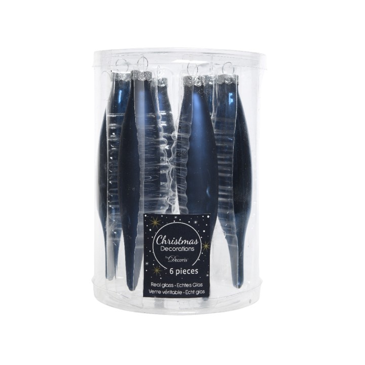 A clear cylindrical container holds six elegant, shiny glass ornaments in blue and silver hues.