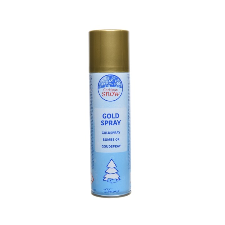 Flacon aérosol doré sur fond blanc, décoré d'un sapin et d'une étiquette bleue.