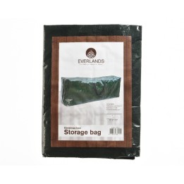 Sac de rangement noir pour sapin de Noël, avec étiquette et fond marron.