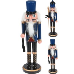 Three colorful nutcracker figurines in blue, black, and gold, each with distinct poses and details.