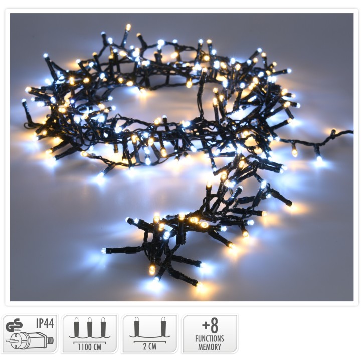 A tangled string of blue and warm white fairy lights on a dark background.