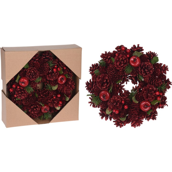 Couronne festive en pommes de pin rouges, ornée de baies et présentée dans un boîte marron.