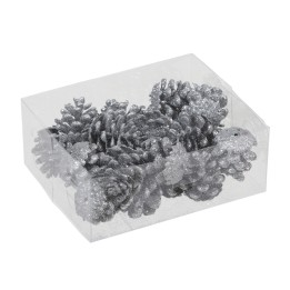 A clear box contains shimmering silver pinecones, elegantly arranged with a touch of sparkle.