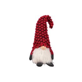 Nain de jardin en peluche, chapeau rouge à pois, barbe blanche, assis sur un fond blanc.