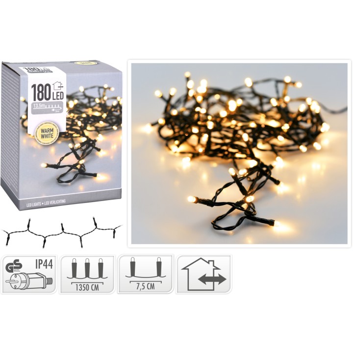 A box containing warm white LED string lights, tangled with small, glowing bulbs.