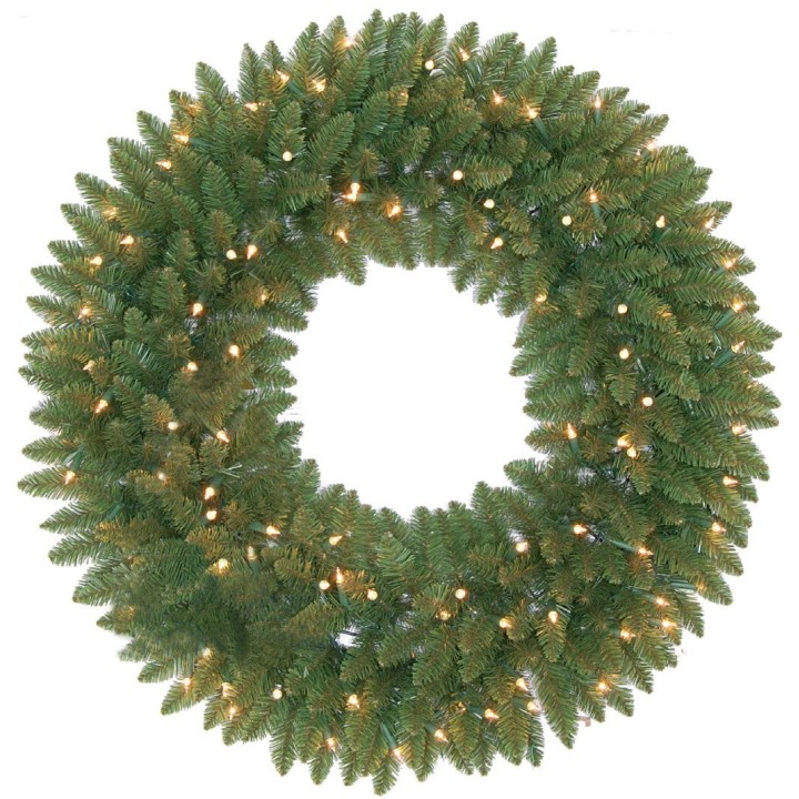 A lush green wreath adorned with twinkling white lights, creating a festive ambiance.