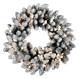 A snowy pinecone wreath adorned with warm white lights, creating a festive ambiance.