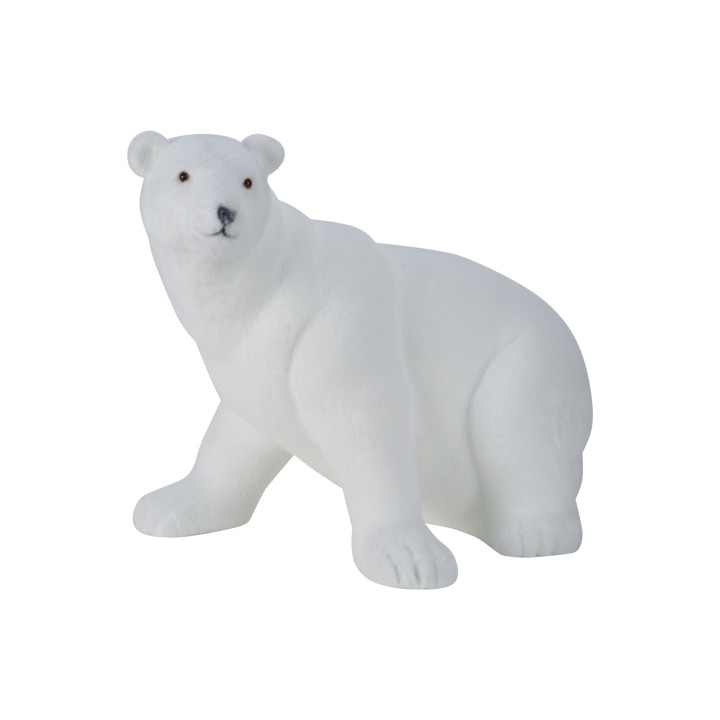 A smooth, white sculpture of a polar bear in a sitting position, with subtle detailing.
