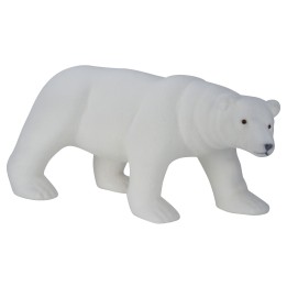 A smooth, white polar bear figurine with rounded features and subtle black eyes.