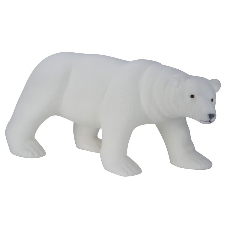 A smooth, white polar bear figurine with rounded features and subtle black eyes.