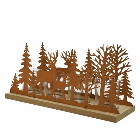 A decorative wooden centerpiece featuring cut-out trees and a deer silhouette.