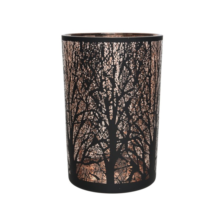 A cylindrical lantern with intricate tree silhouettes casting warm, glow patterns.