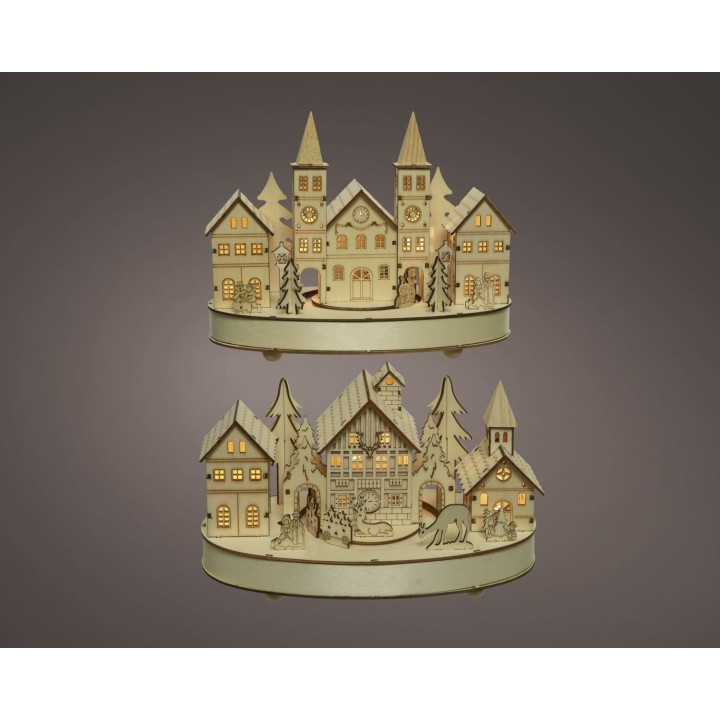 A layered wooden village scene with illuminated houses, trees, and charming architecture.