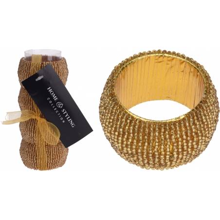 A shimmering gold beaded decorative piece with a textured, round shape.