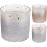 Two candles with stars and glitter