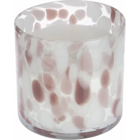 A round candle in a translucent glass holder with soft pink and white speckled patterns.