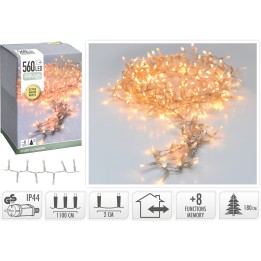A bundle of warm white LED string lights with a soft glow, coiled neatly beside a box.