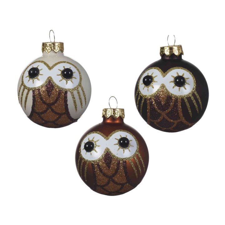 Boules de Noël en forme de hiboux, ornées de paillettes dorées et de grands yeux expressifs.