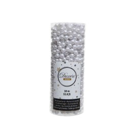 A clear cylindrical container filled with shiny, silver decorative pearls.