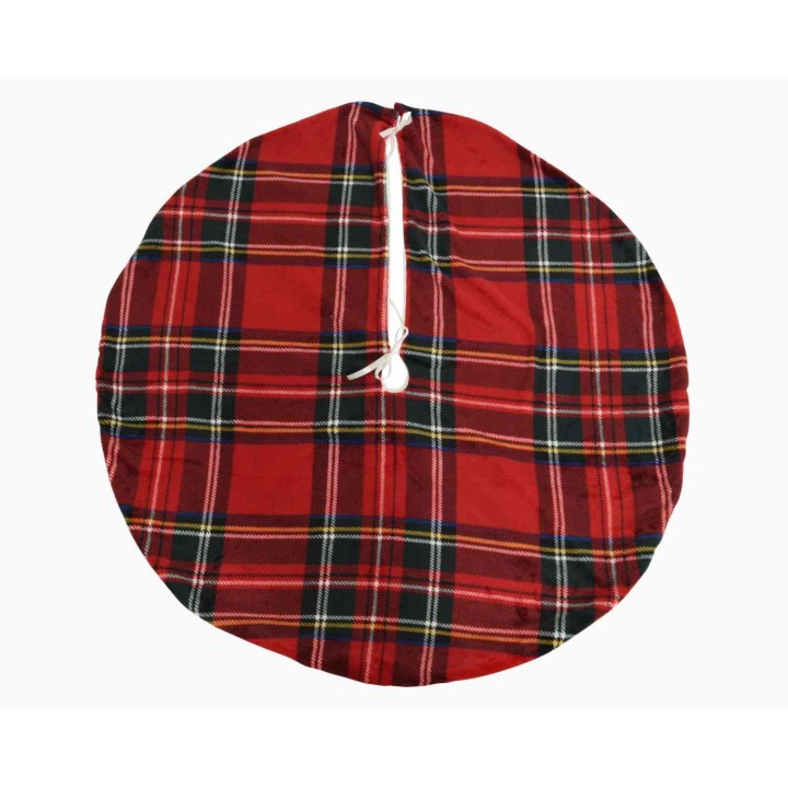 Tissu rond à motifs écossais rouges, verts et noirs, avec un cordon blanc pour le fermer.