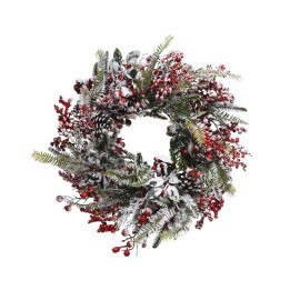 Couronne festive ornée de baies rouges, feuillage vert et touches de neige.