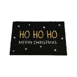 A black doormat with "HO HO HO" in gold and "MERRY CHRISTMAS" in white, surrounded by stars.