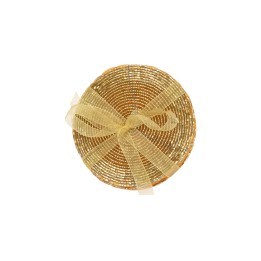 A circular woven basket in gold tones, adorned with a delicate, sheer ribbon bow.