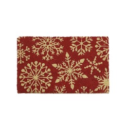 Tapis rouge décoré de flocons de neige dorés, évoquant une ambiance festive.