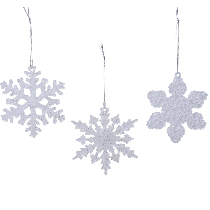 Three delicate white snowflake ornaments with intricate designs, shimmering softly.